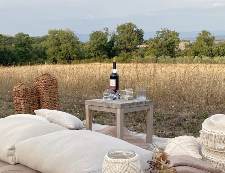 Our organic red wine during a boho picnic at Abbadia Wine Relais.
