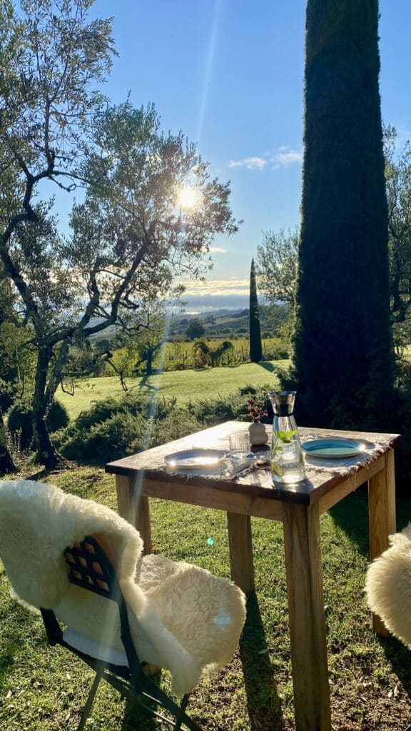 Slow travel in Tuscany: Breakfast in the olive grove at Abbadia Wine Relais.